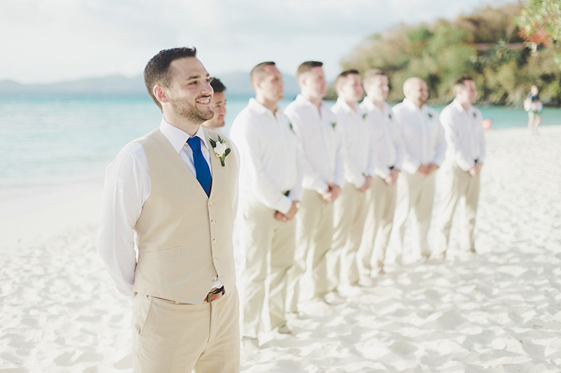 A beach wedding groom suit