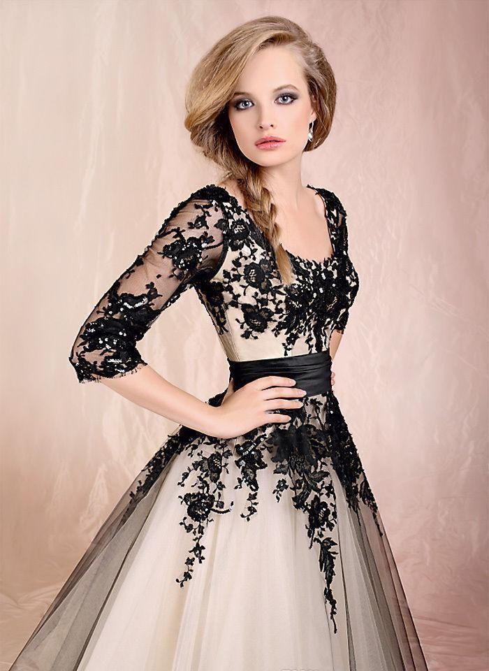 An ivory wedding dress with black lace