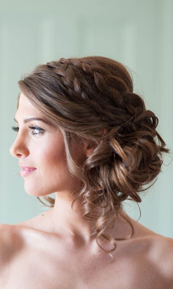 A soft chignon with loose curls