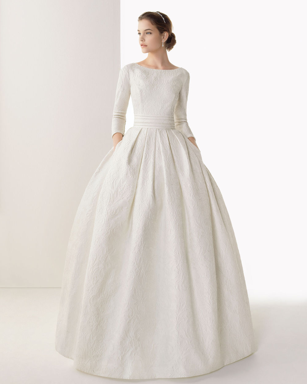 A high neck wedding dress with long sleeves