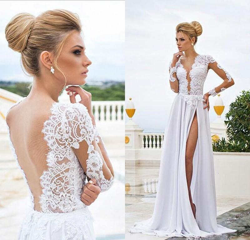 An open back wedding gown with long sleeves