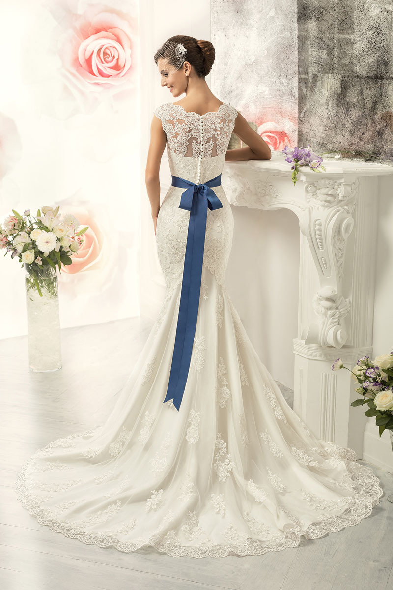 Wedding dress with blue ribbon