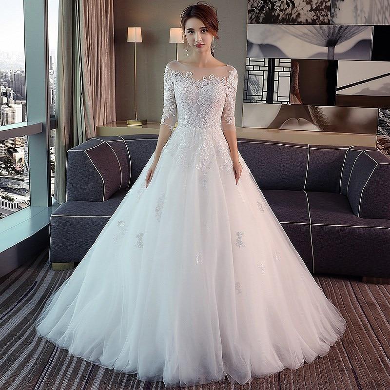 Illusion bodice wedding dress