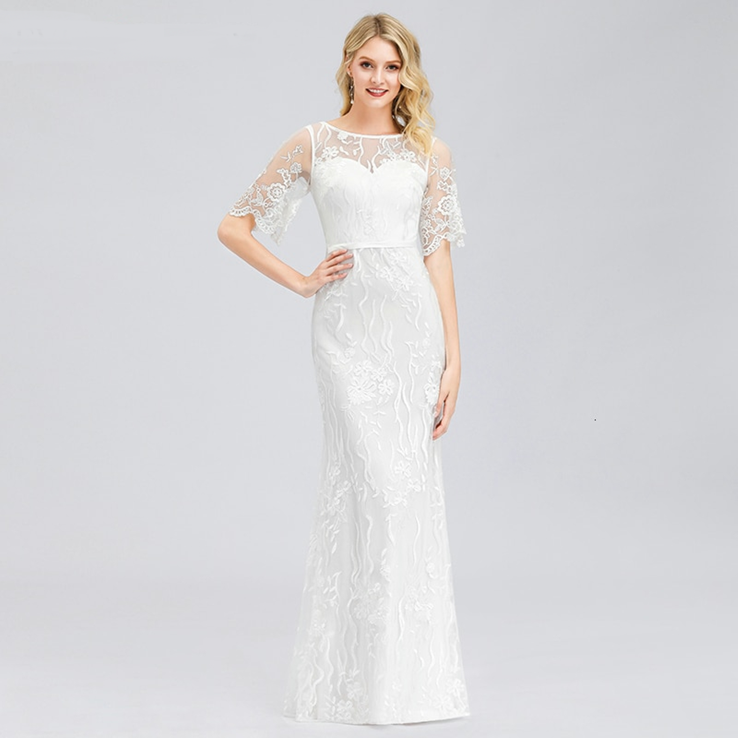 Mermaid wedding gown with flutter sleeves