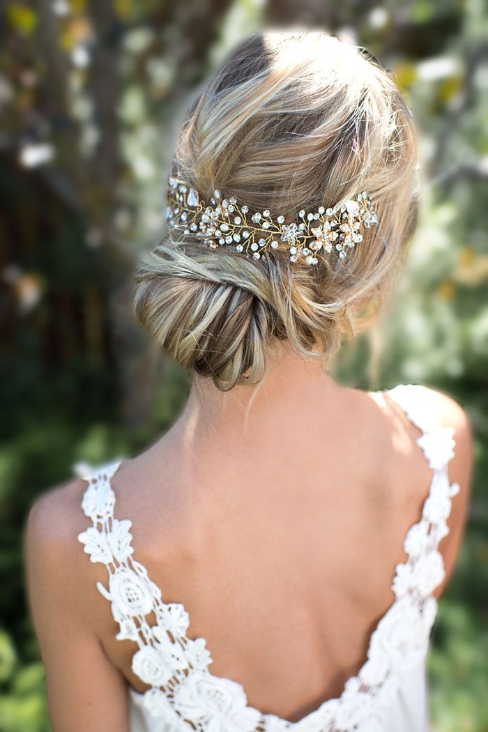 A romantic bride hairstyle with crystals