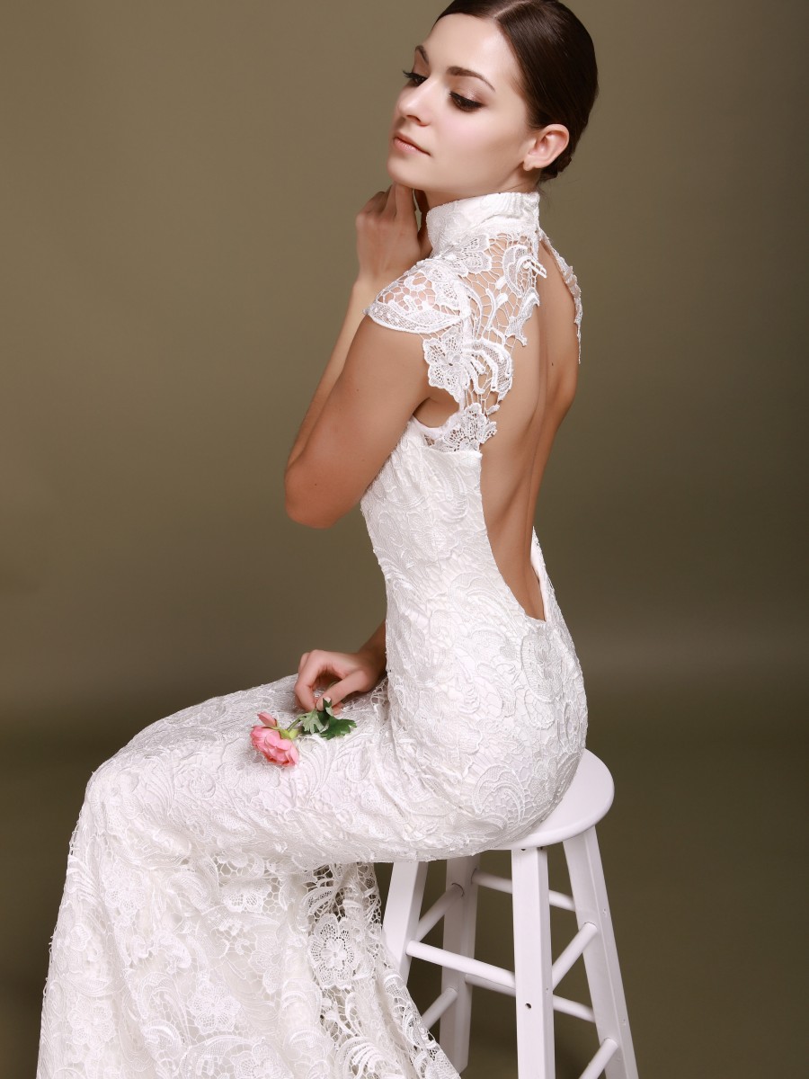 Backless wedding dress with cap sleeves by Vera Wang