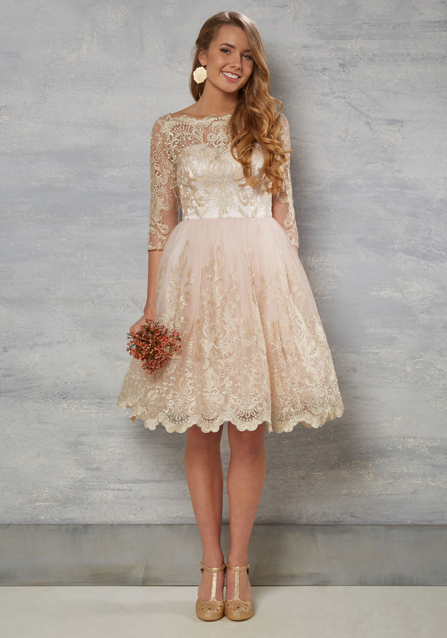 Short lace wedding dress with sleeves