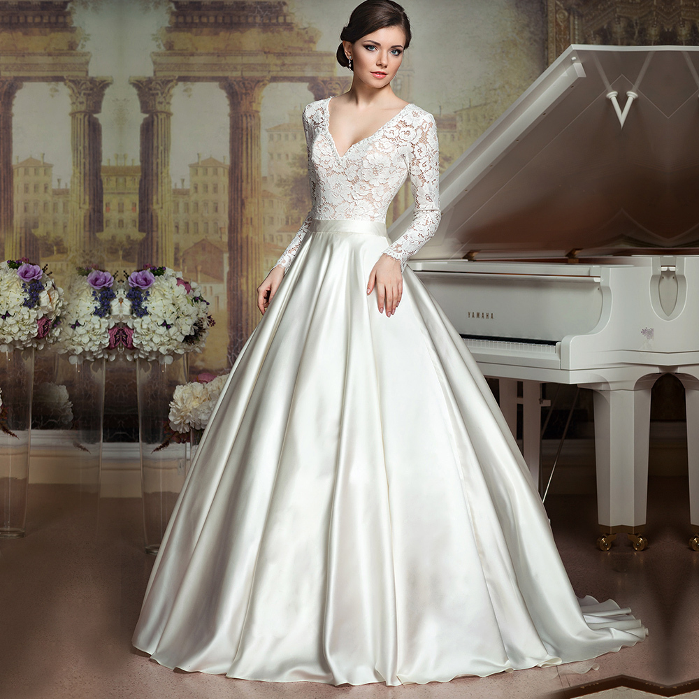 V-neckline wedding dress with lace sleeves