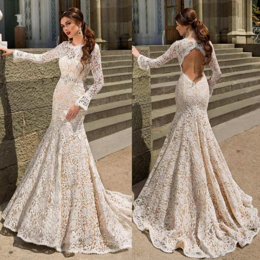 Lace wedding dress with sleeves and open back