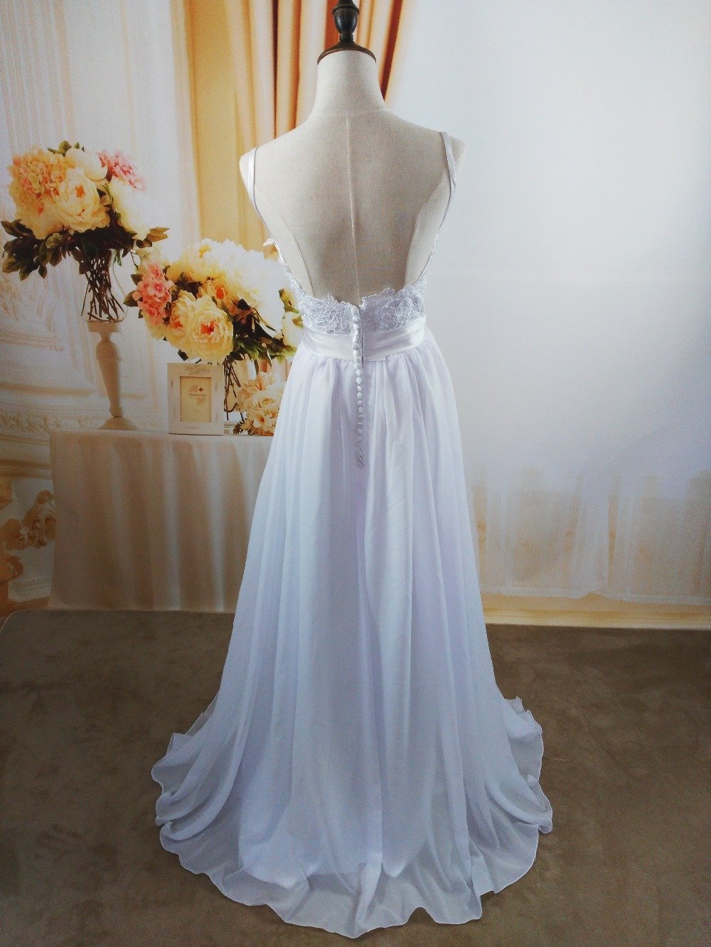 A-line wedding dress with-low back and spaghetti straps