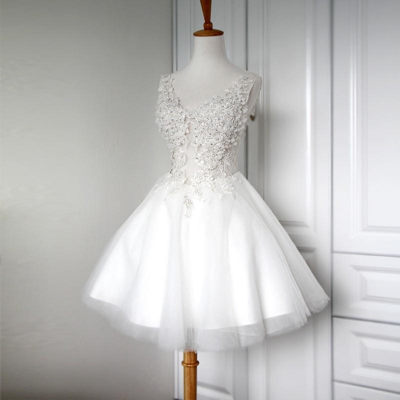 Short wedding dress with a tulle skirt