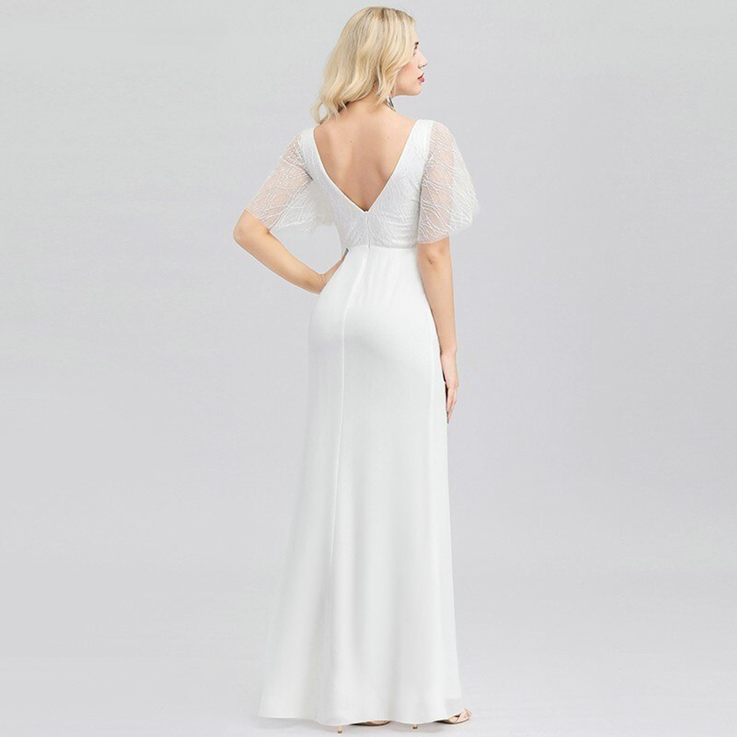 Low back wedding dress with flutter sleeves