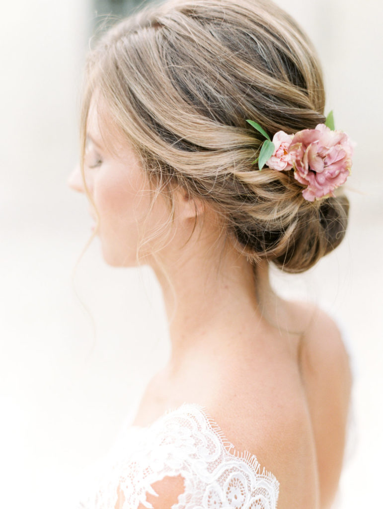 Romantic bridal updos with flowers