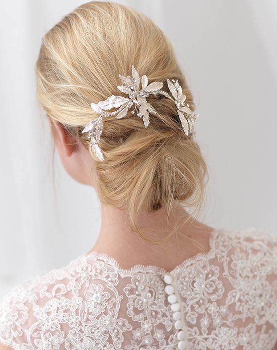Updo with statement headpiece