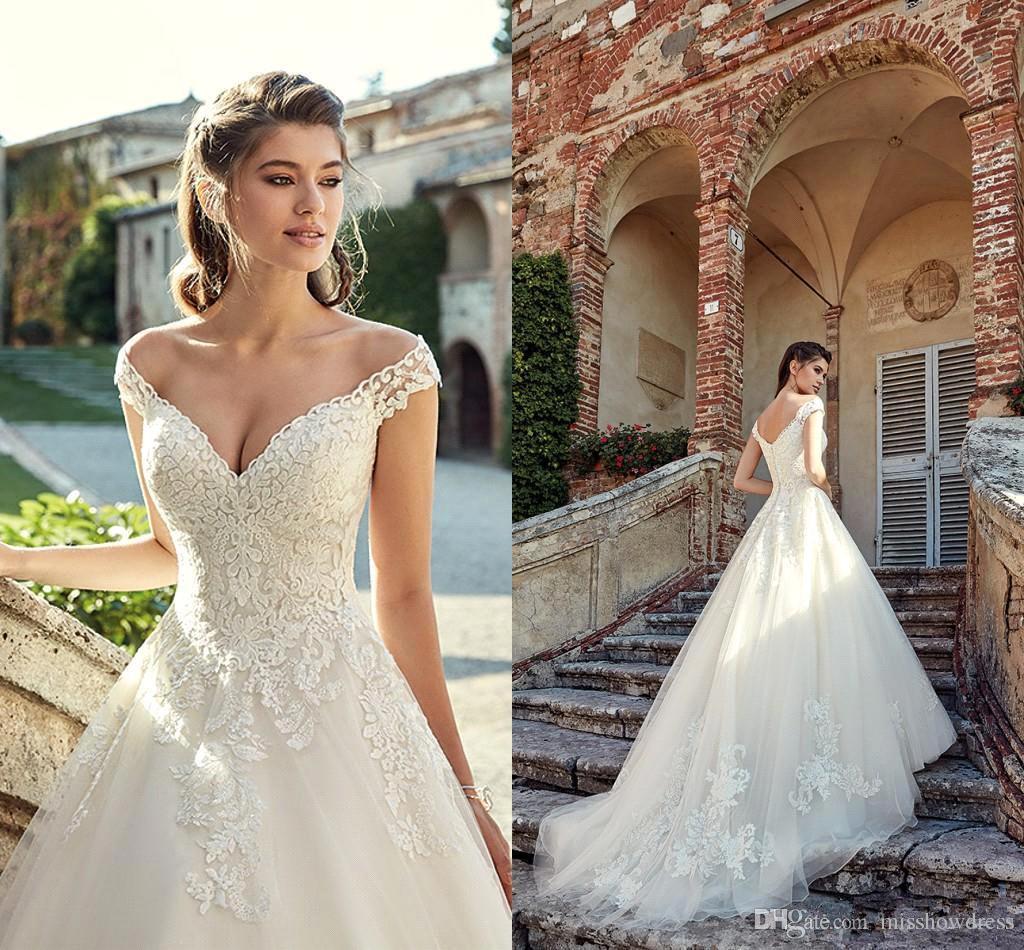 Off-the-shoulder wedding dress with train
